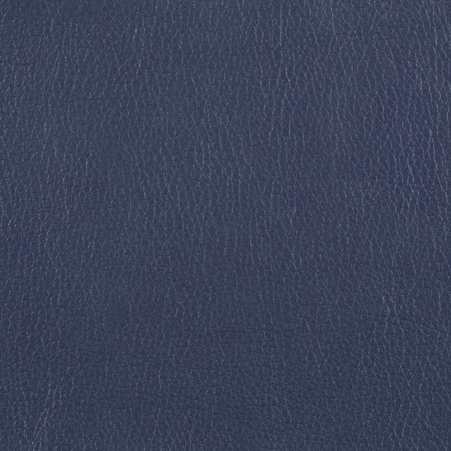 Deep ink-navy textile with fine pebbled texture and subtle lighter threads