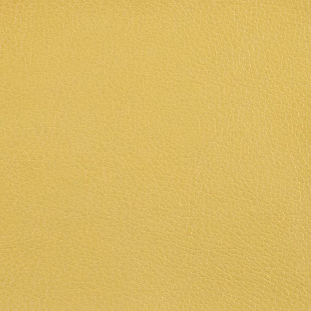 Warm mustard yellow fabric with a fine, softly pebbled textured surface