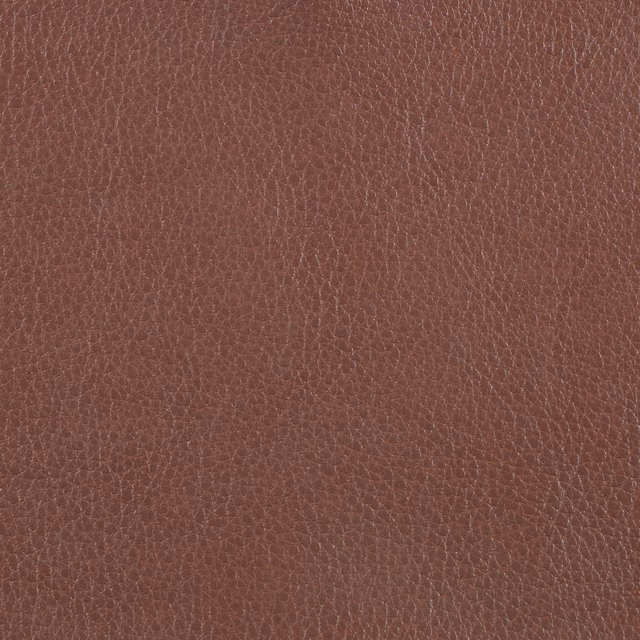 Warm russet tan fabric with a close irregular pebbled texture