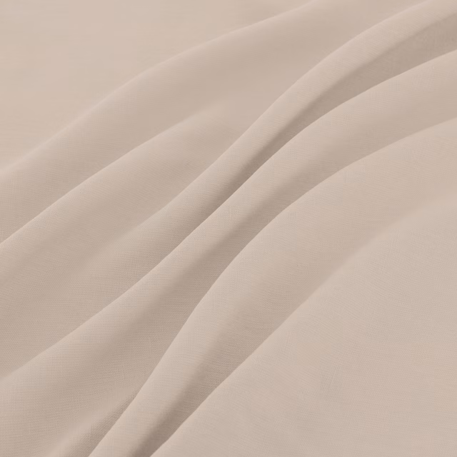 Warm ecru plain fabric with a fine weave falling into broad fluid folds