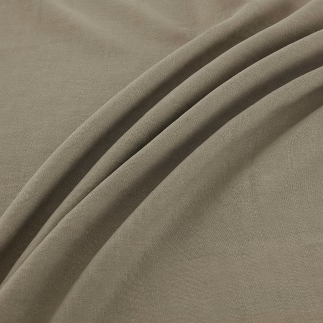 Folded swatch showing muted herb olive cloth with a fine woven crosshatch texture