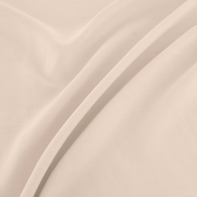 Pale warm-ivory plain weave falling into soft diagonal folds