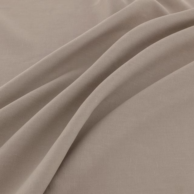 Muted taupe khaki fabric with fine weave draped into soft flowing folds
