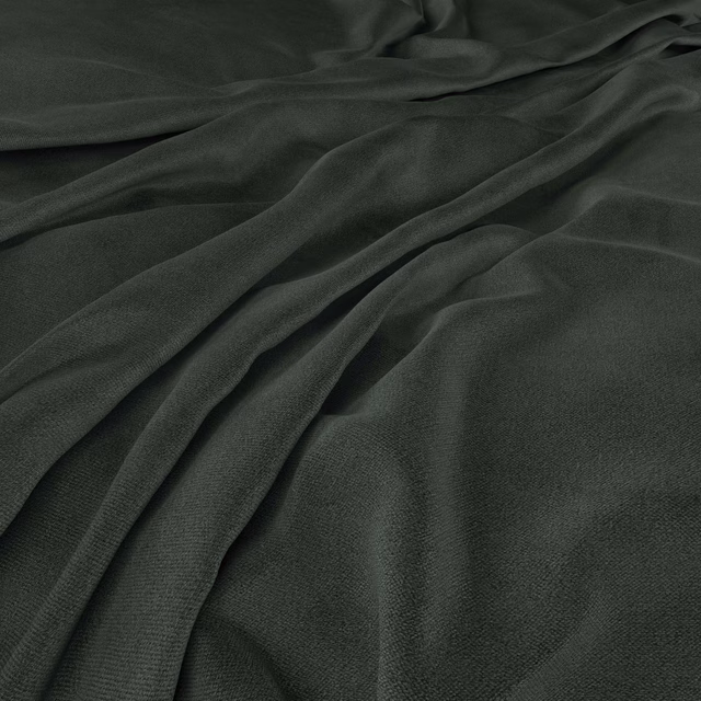 Deep bottle-green fabric with fine weave falling into soft, flowing folds