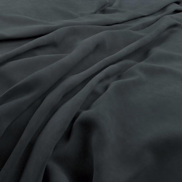 Deep malachite green plush fabric gathered into soft, shadowed folds