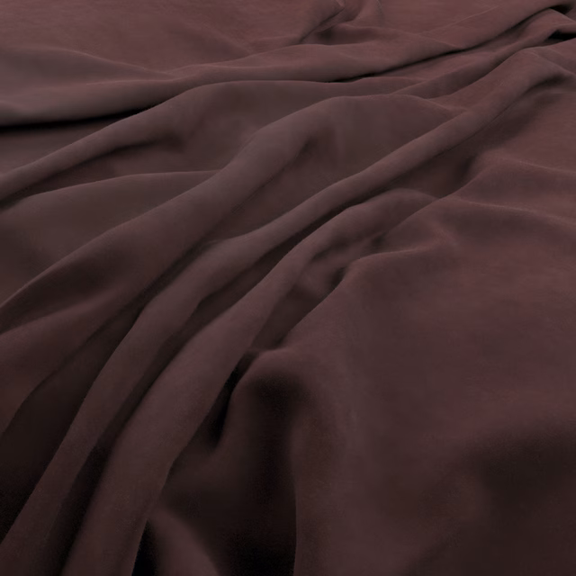 Deep plum-brown plush fabric gathered into softly lustrous, shadowed folds