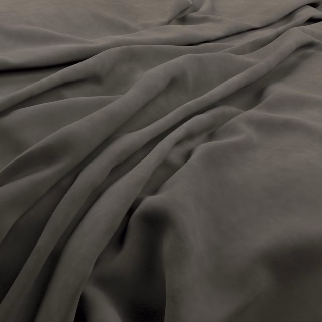 Deep slate-grey textile with smooth sheen folding into soft, shadowed drapes