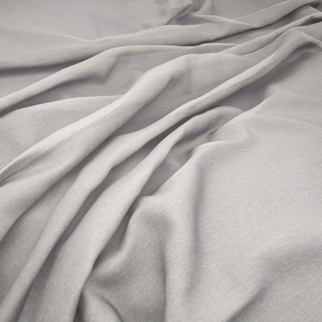 Pale ash-grey woven cloth forming soft, fluid folds with a subtle sheen