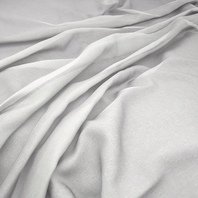Pale ivory cream fabric in loose folds with a fine, subtly textured surface
