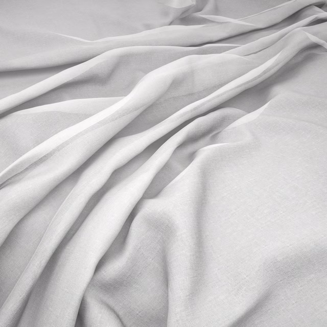 Pale ivory fine-weave fabric draped in soft folds with subtle grey shadows