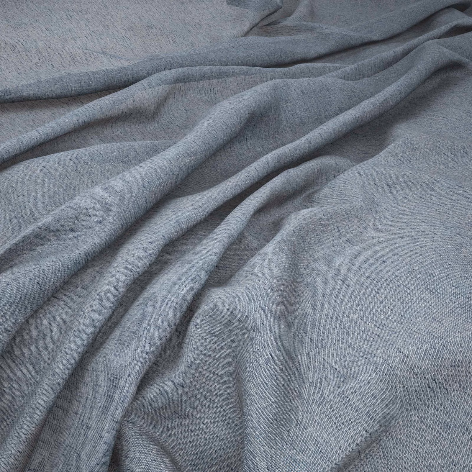 Cool ocean blue-grey woven fabric with fine texture arranged in soft flowing folds