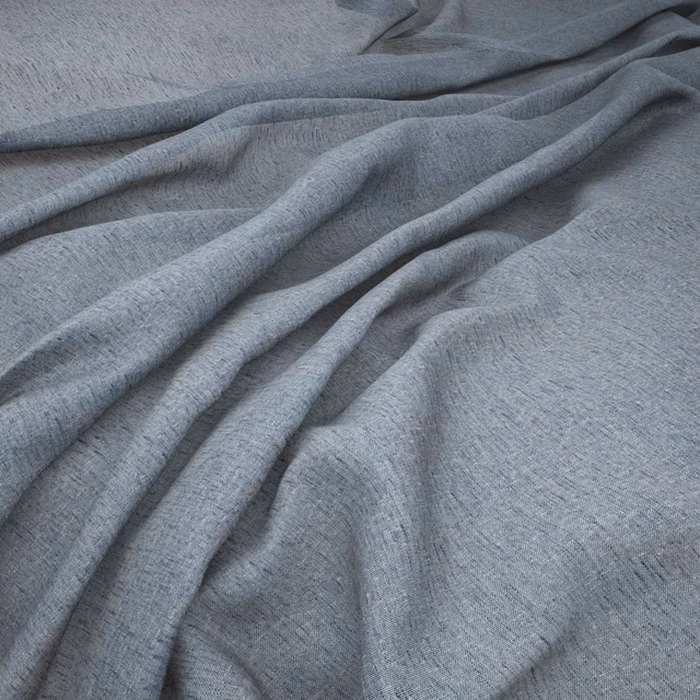 Cool ocean blue-grey woven fabric with fine texture arranged in soft flowing folds