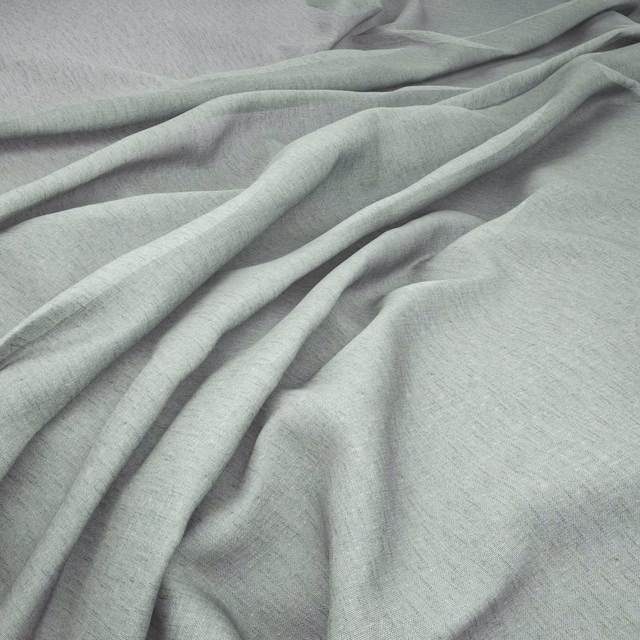 Pale seaglass-green finely woven fabric gathered into soft, fluid folds
