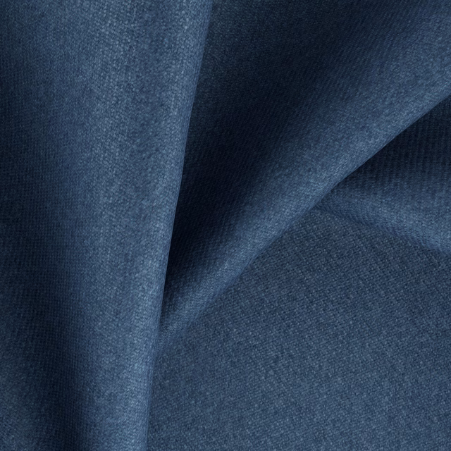 Deep Aegean blue fabric with a fine mottled weave shown in soft folds