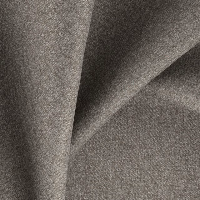 Warm taupe-grey Melton fabric showing a fine heathered weave in folded layers