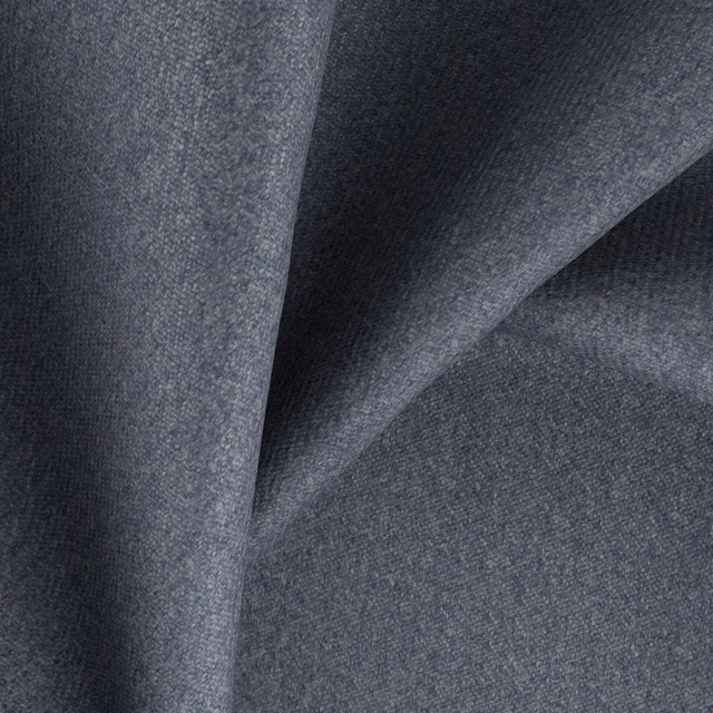 Deep blueberry-blue tightly woven textile with subtle heathered texture in folded swatch