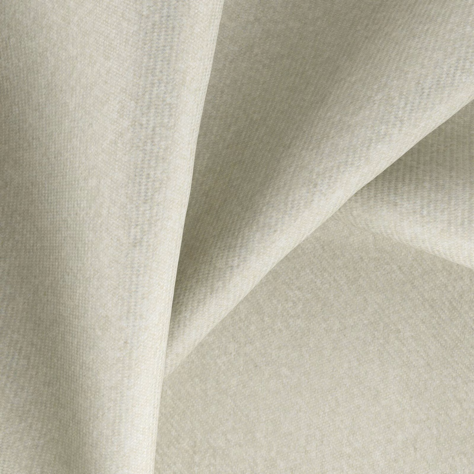 Soft ivory-greige fabric with a fine woven texture draped into gentle folds