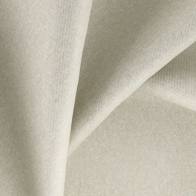 Soft ivory-greige fabric with a fine woven texture draped into gentle folds