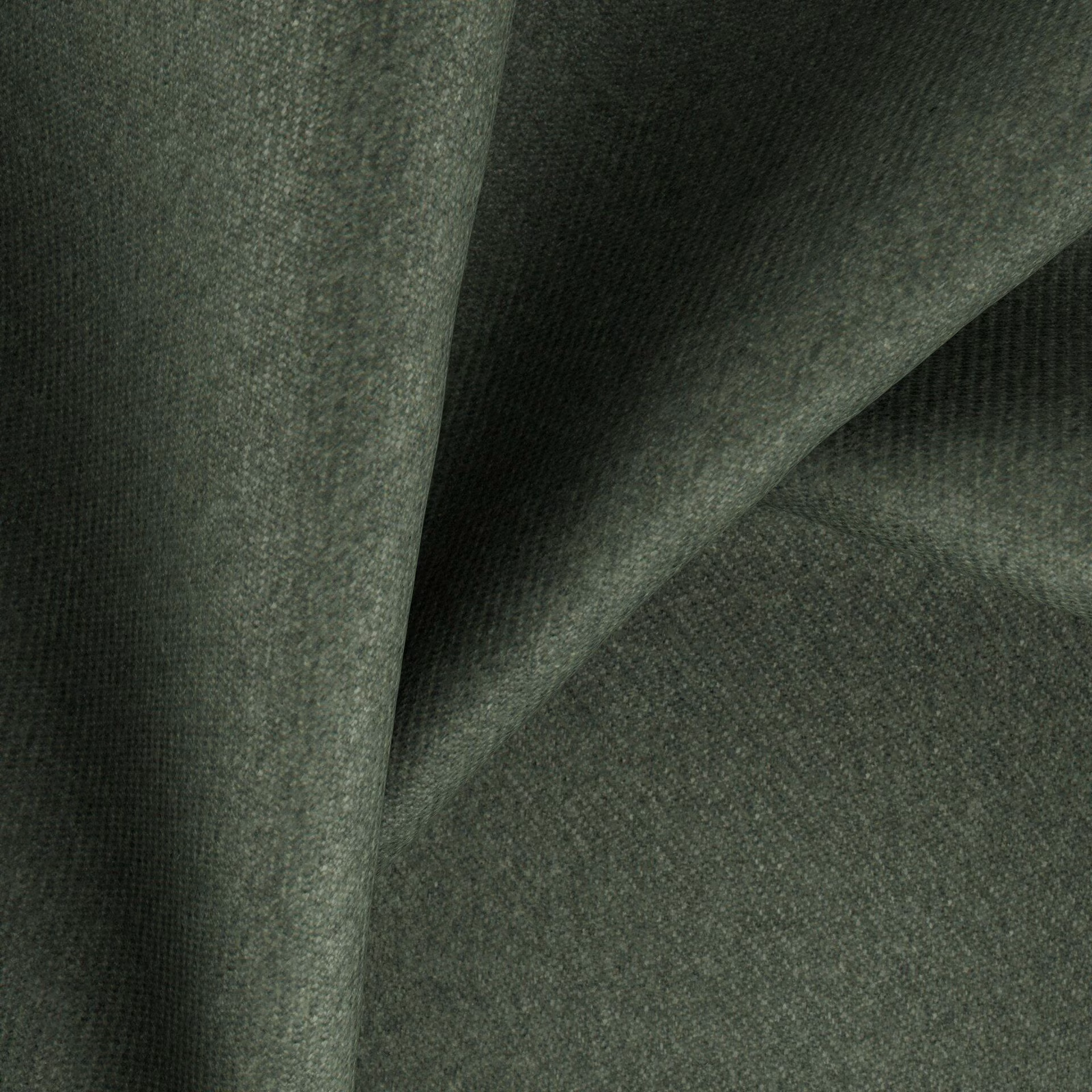 Deep fir-green woven fabric with fine texture shown in overlapping folded layers