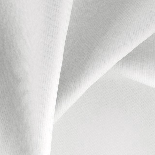 Pale icy-white Melton fabric with fine woven texture and softly shaded folds