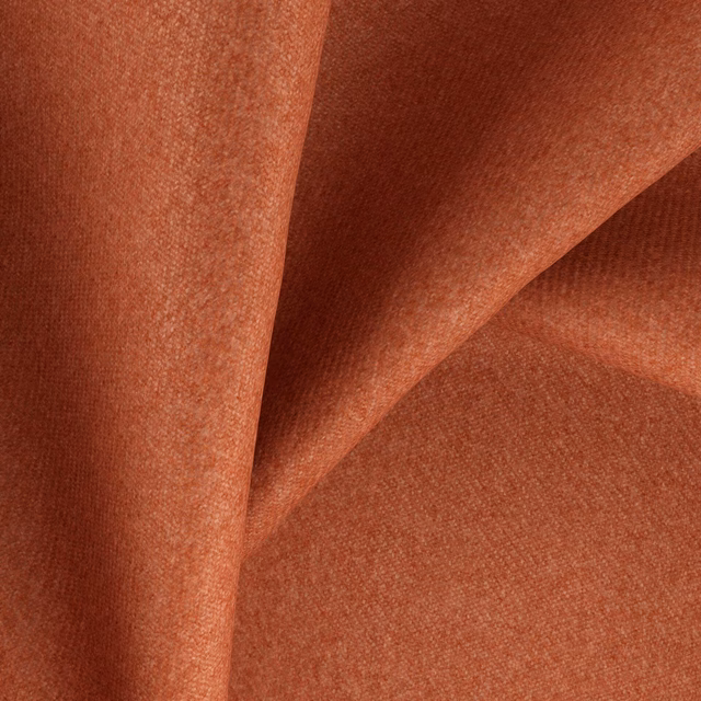 Warm Marsala terracotta fabric with a close, softly flecked woven texture