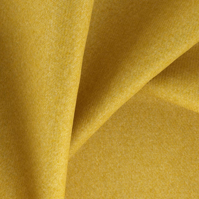 Golden primrose woven textile with fine grain and softly folding surface