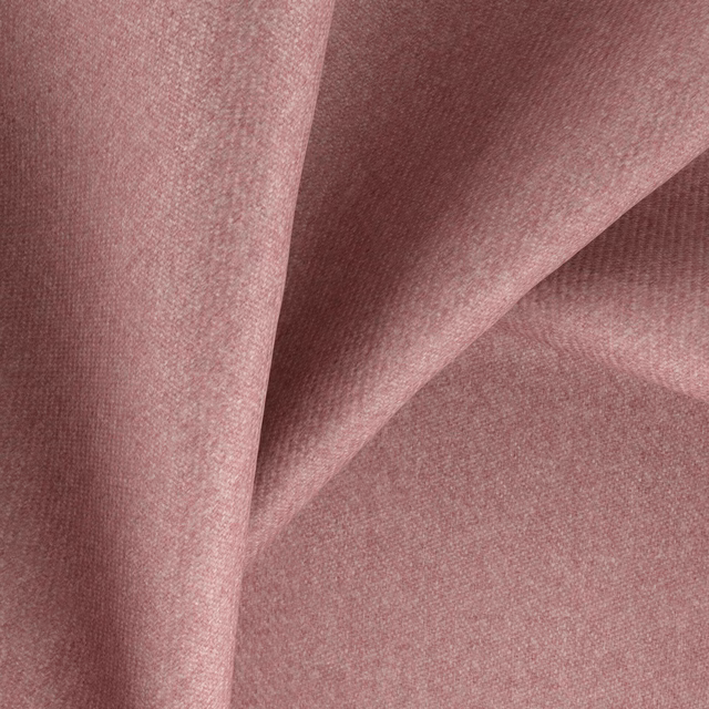 Dusty rose-pink woven fabric draped in folds, showing a fine even grain