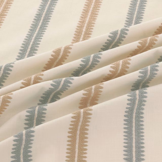Cream Meschutt fabric with muted blue-grey and tan vertical woven motifs