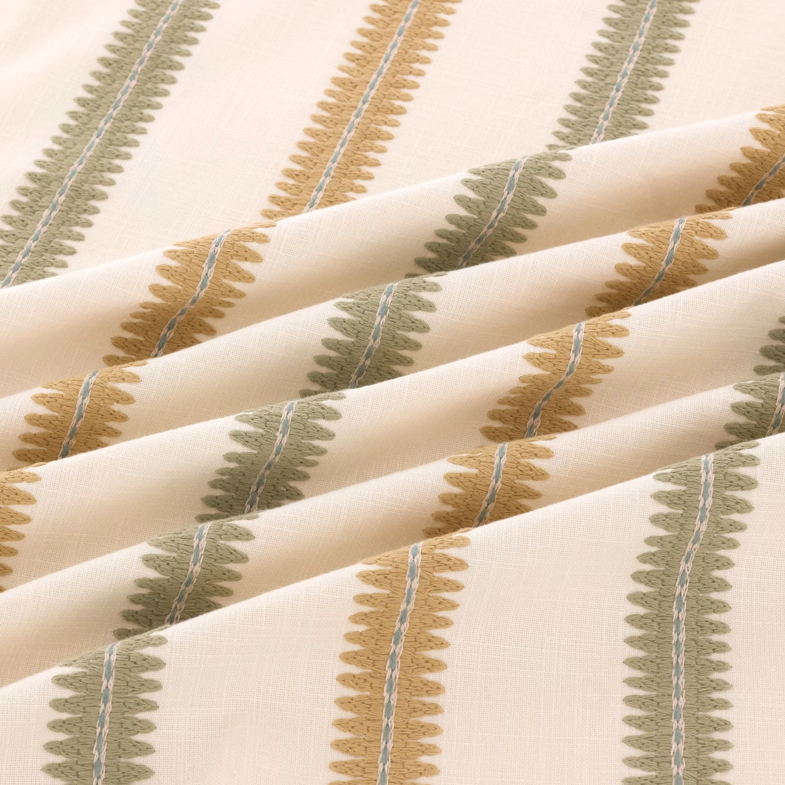 Cream woven swatch with olive and ochre leaf stripes and blue-grey lines