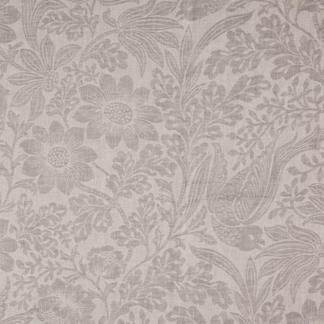 Pale porcelain-grey fabric with tonal floral, leafy and paisley motifs in a fine woven texture