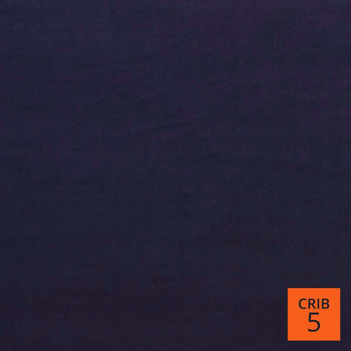 Deep ink navy textile with shadowy horizontal texture across a dark swatch