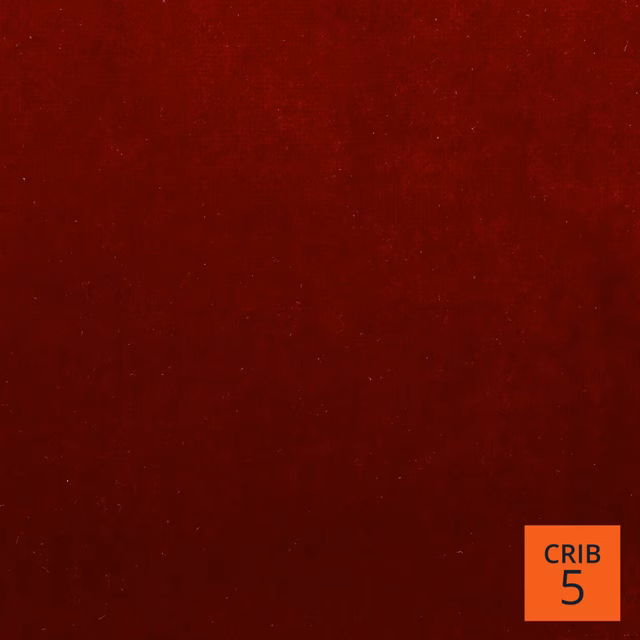 Deep garnet-red Mystere fabric with a subtly mottled, low-sheen surface