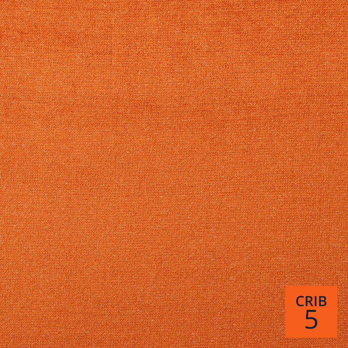 Close-up of warm tangerine-orange plain weave with subtle tonal flecking