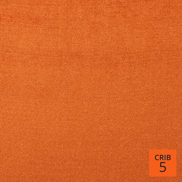 Close-up of warm tangerine-orange plain weave with subtle tonal flecking