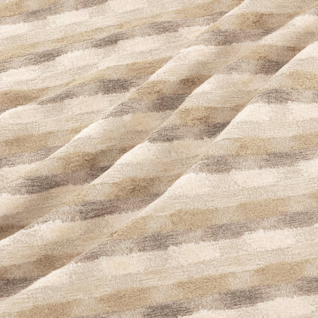 Warm cream fabric with broad taupe bands and a raised, softly mottled weave