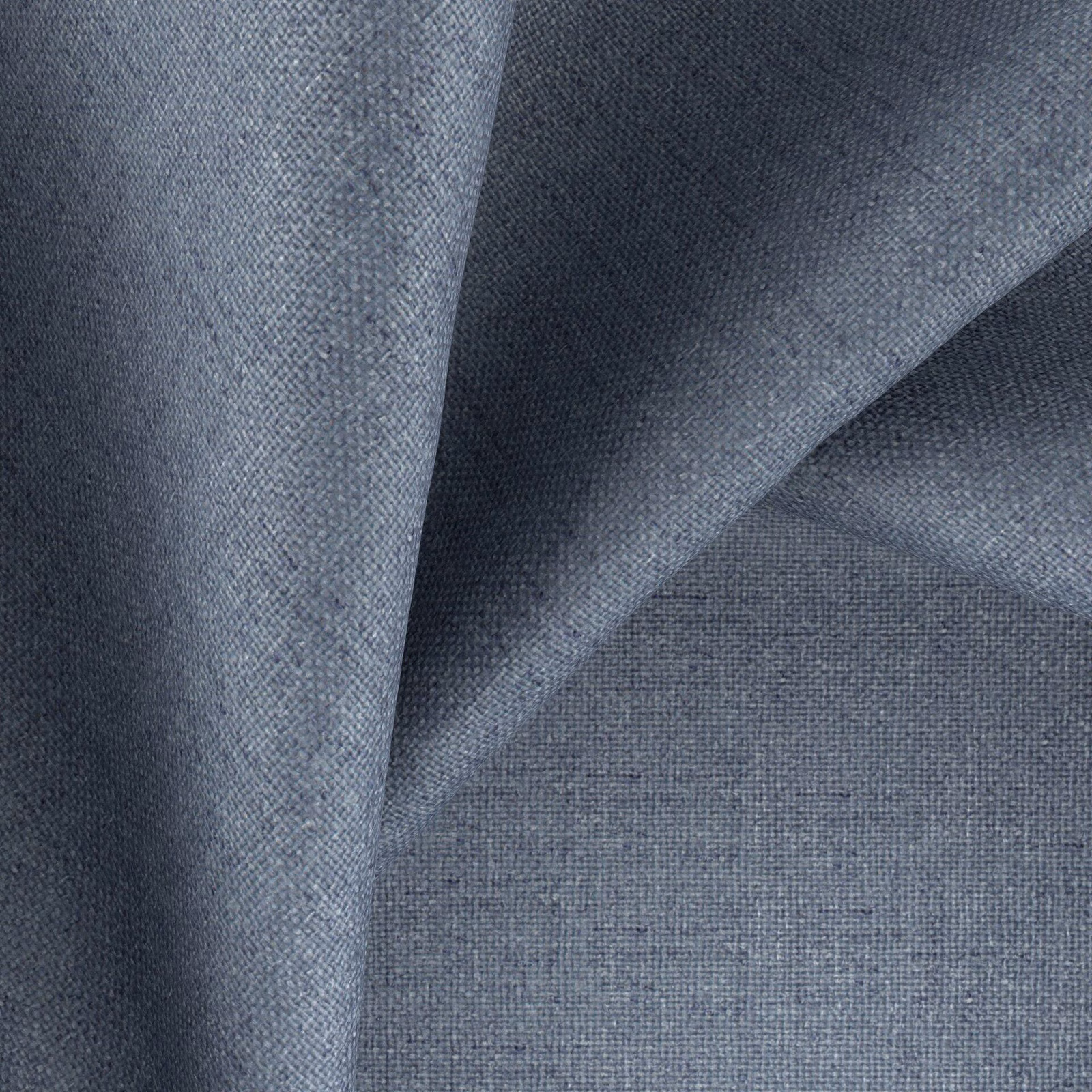 Deep blue-grey woven textile showing fine plain texture and softly shaded folded surface