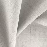 Pale mist-grey woven textile folded to reveal a fine, softly flecked surface