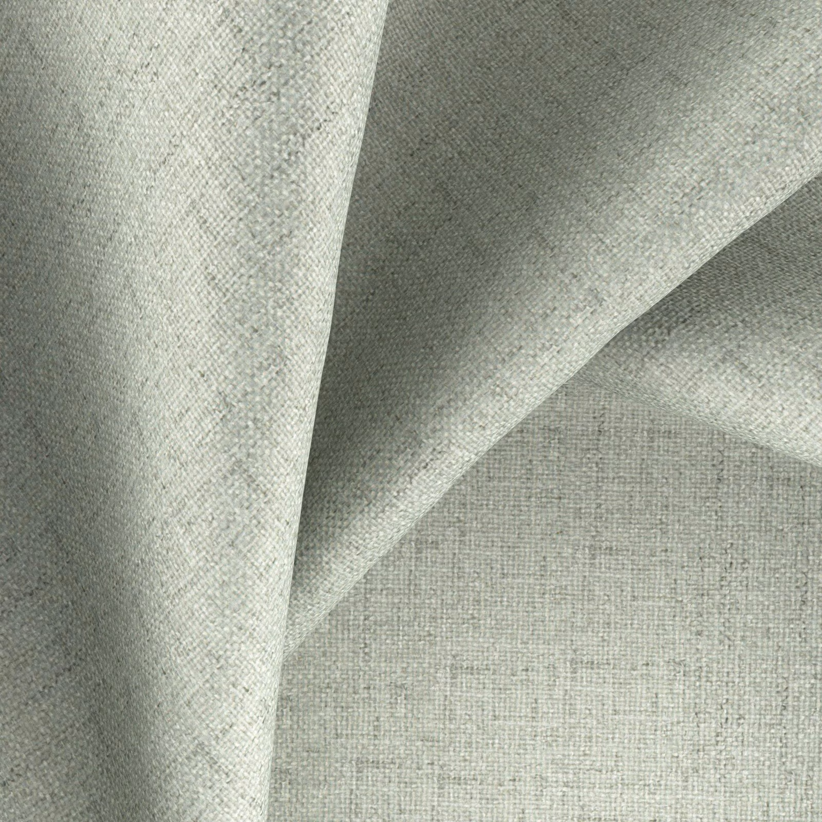 Pale saltwater blue-grey fabric with fine woven texture folded to show soft drape