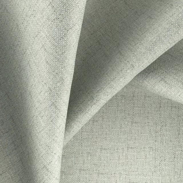 Pale saltwater blue-grey fabric with fine woven texture folded to show soft drape