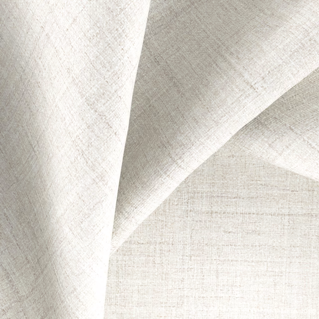 Pale ivory-grey Windblown fabric with fine crosshatched weave shown in angular folds