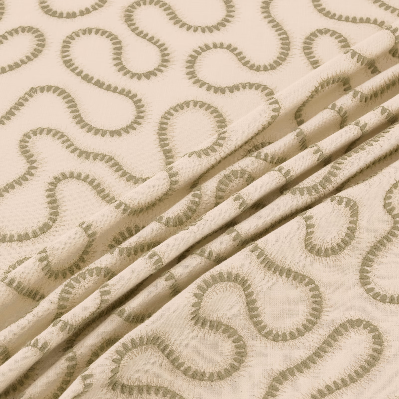 Cream fabric with muted willow-green looping paisley motifs and a fine woven texture
