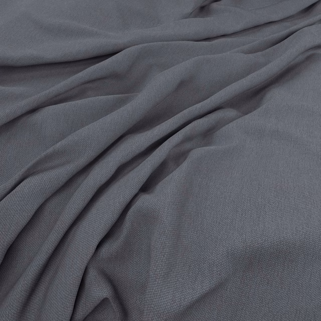 Deep blue-grey woven fabric shown in soft folds with a fine textured surface