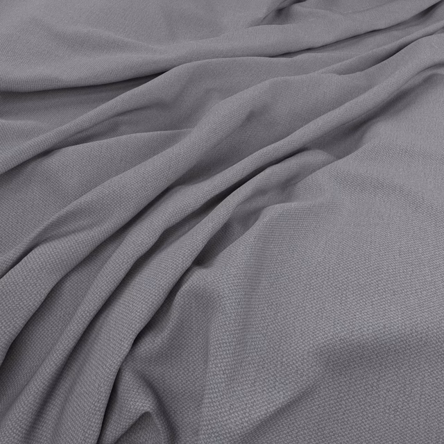 Soft slate-grey woven fabric shown in loose folds with a fine micro-texture