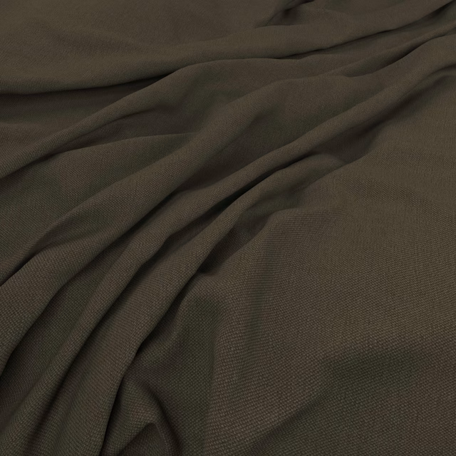 Dark fir-green woven cloth with a fine texture gathered into soft diagonal folds