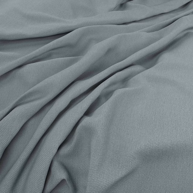 Cool blue-grey woven cloth with fine texture gathered into soft folds