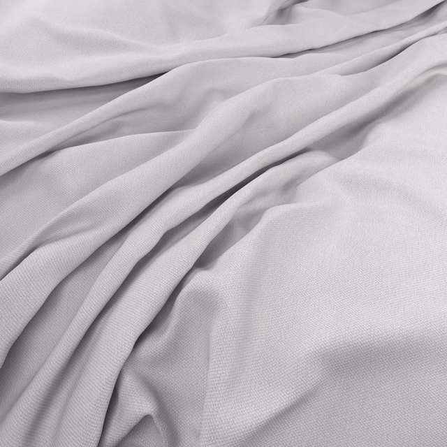 Pale ice-grey woven fabric gathered into soft, fluid folds