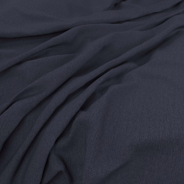 Deep midnight navy plain-weave fabric gathered into soft, fluid folds