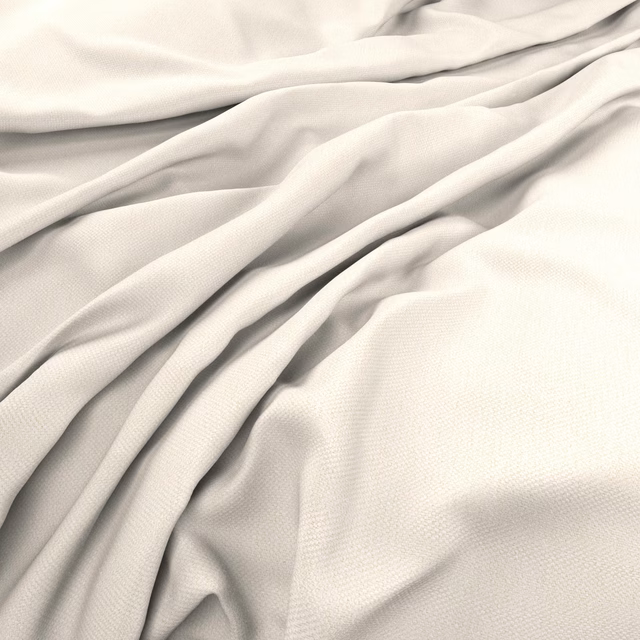 Soft ivory woven fabric gathered into fluid folds with a subtly textured surface