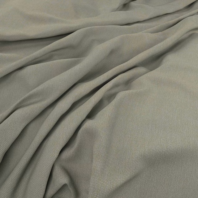 Muted grey-green woven fabric gathered into soft, fluid folds