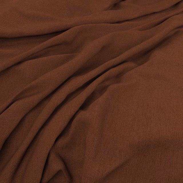 Warm Tuscan brown woven fabric draped in soft folds with fine texture
